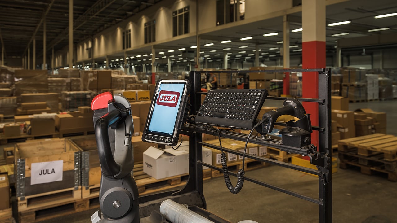 Handheld Algiz 10X docked in truck at warehouse