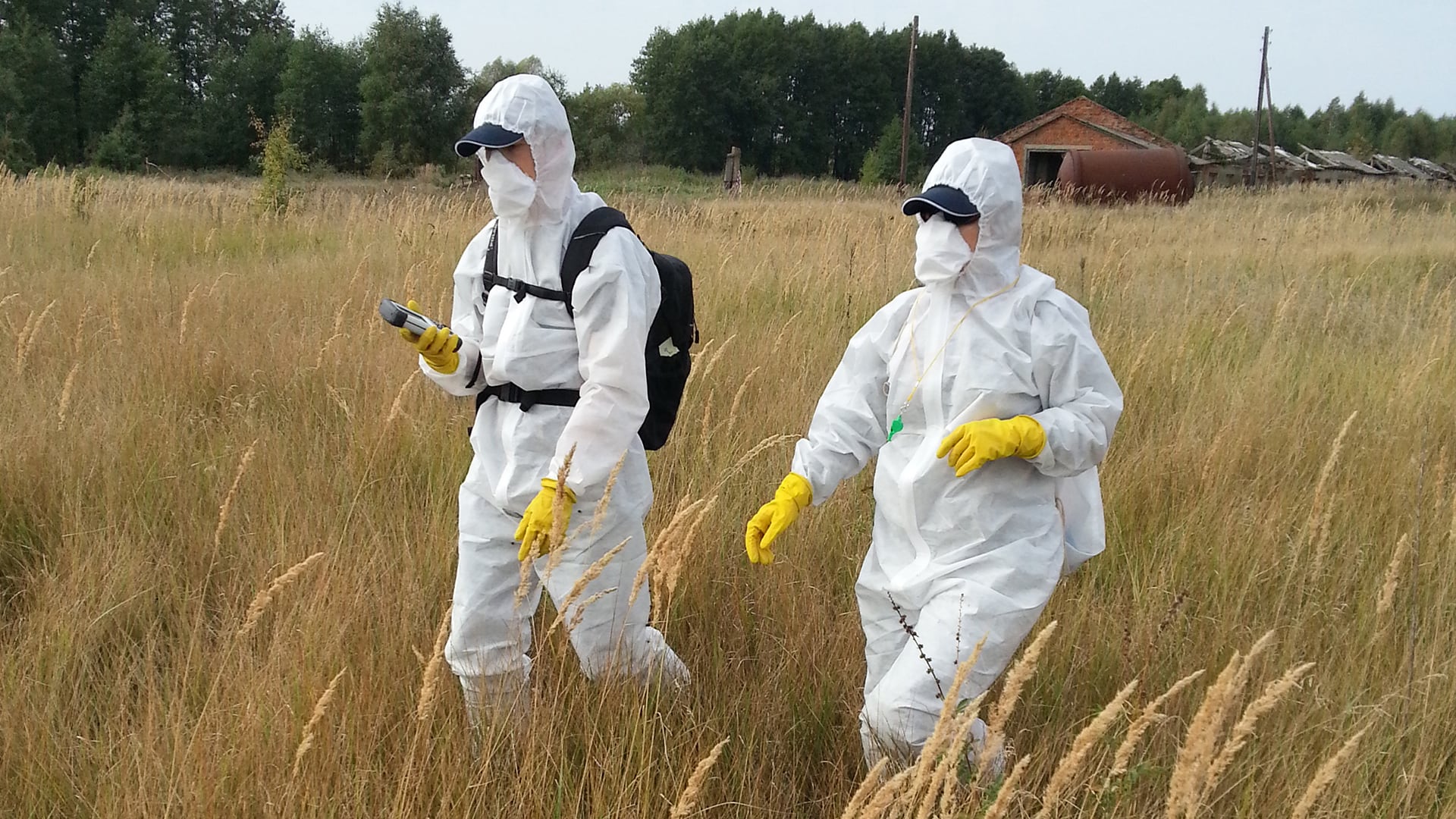 Workers searching for radiation with the Handheld Nautiz X8