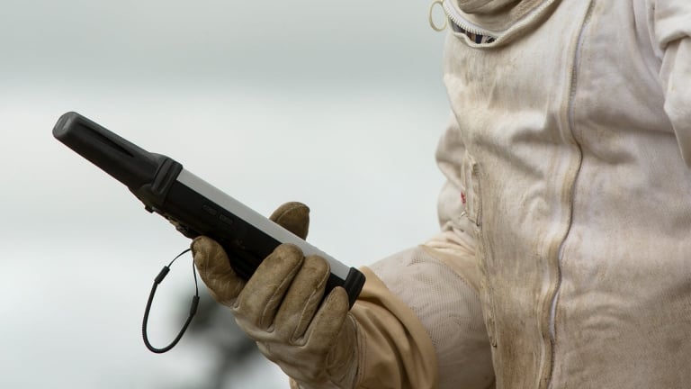 Handheld Nautiz X8 used by beekeeper